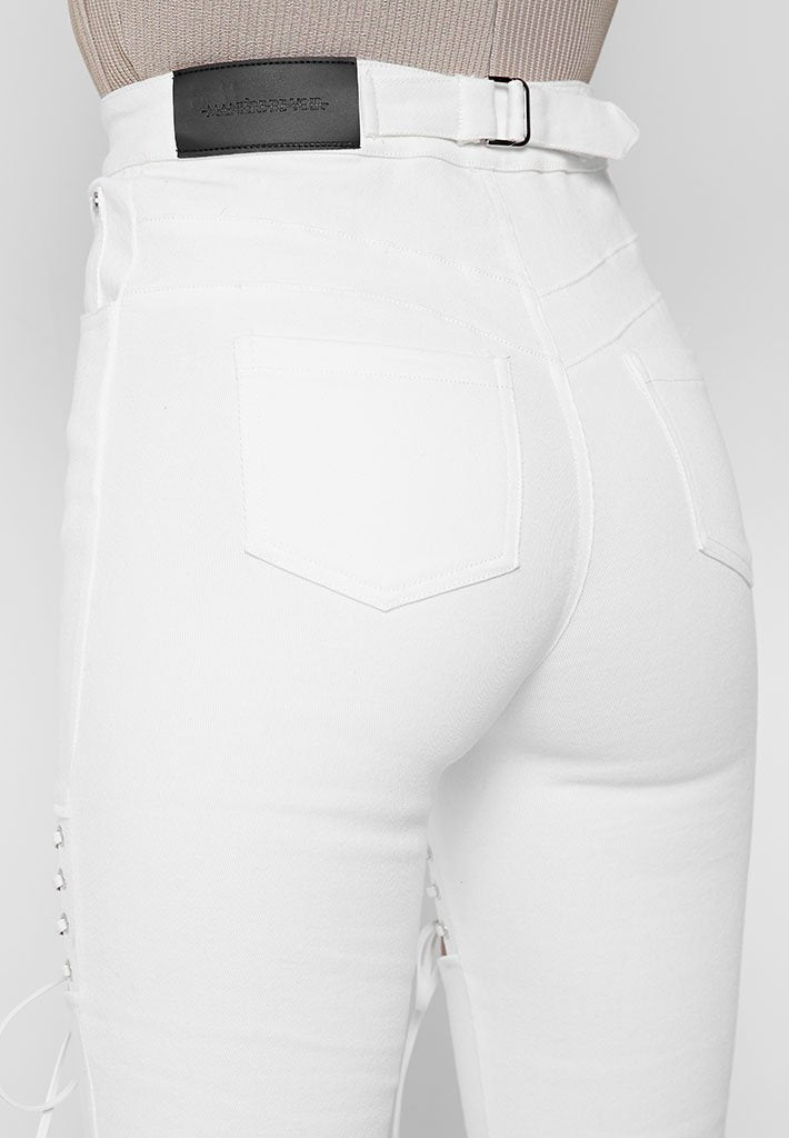 white cut up skinny jeans