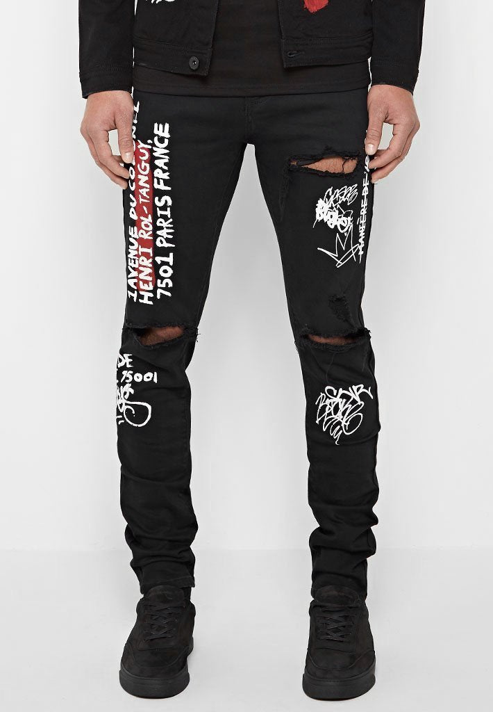 distressed graffiti jeans