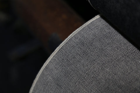 Selvedge parts curling up or down