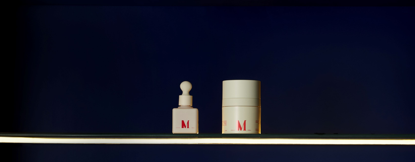 A photo of Dr. Diamond's Metacine products lined up in a cabinet