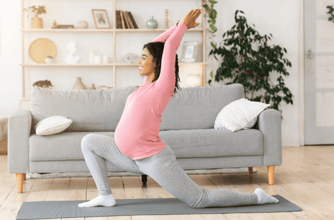 Pregnant woman doing hip flexors