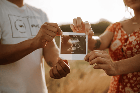 Parents holding ultrasound