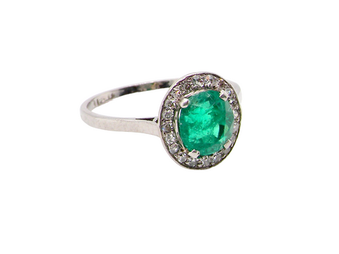 A fine early 20th century emerald and diamond ring
