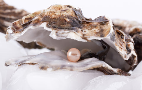 pearl growing in shell