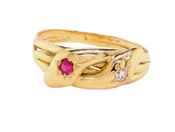 An Edwardian ruby and diamond snake head ring