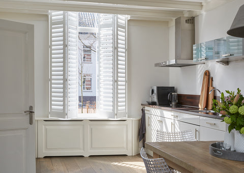 white_plantation_shutters_in_kitchen