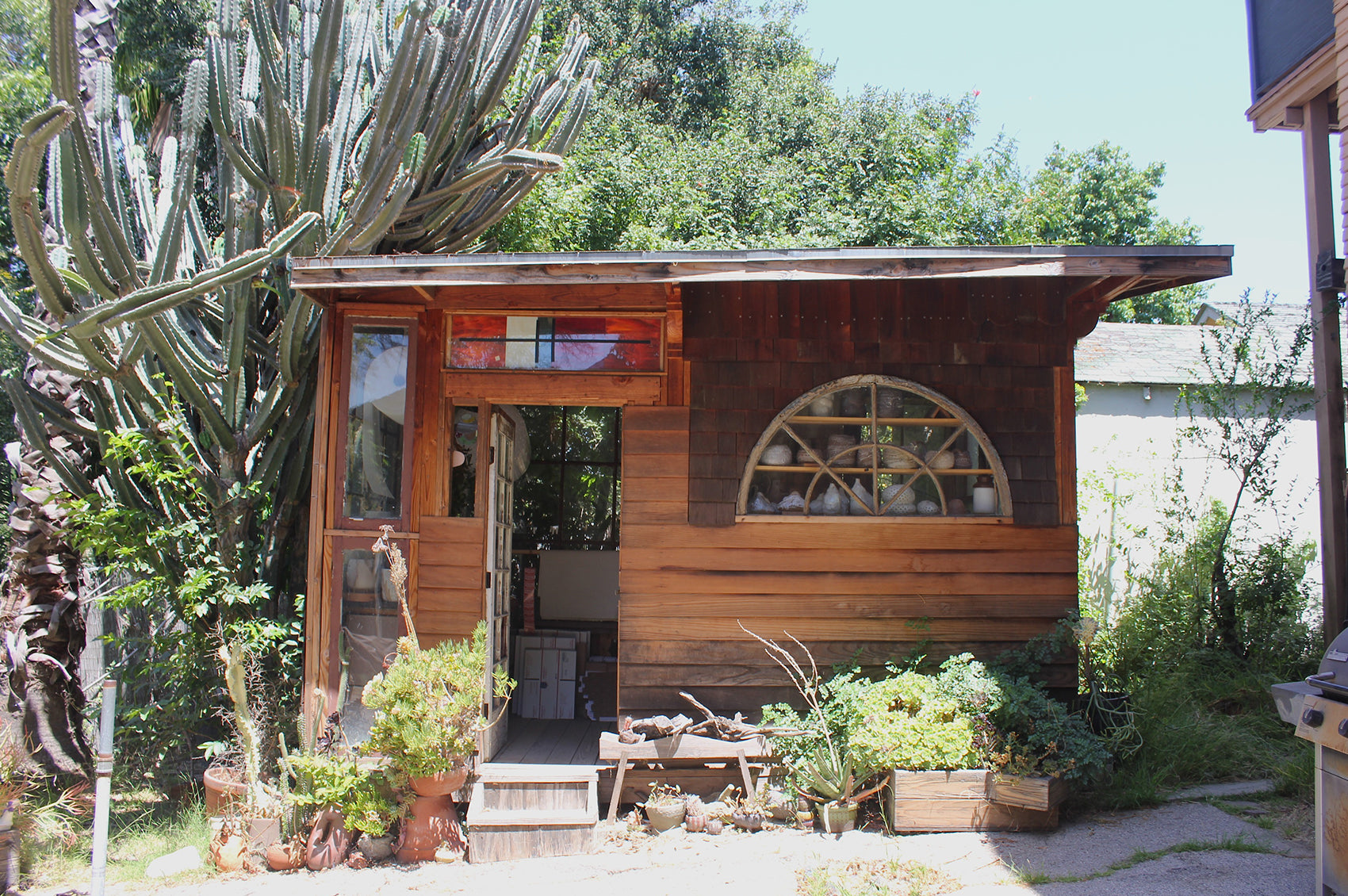 Linda's wooden paneled studio.