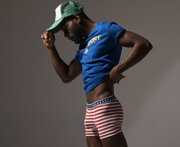 Lifestyle editorial image featuring Cocksox CX12 Americana Collection men's underwear boxers in Liberty Stripe