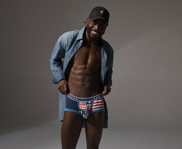 Lifestyle editorial image featuring Cocksox CX68N Americana Collection men's underwear trunks in Patriot Blue