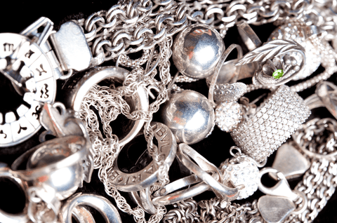 pile of shiny jewelry with rhodium plating