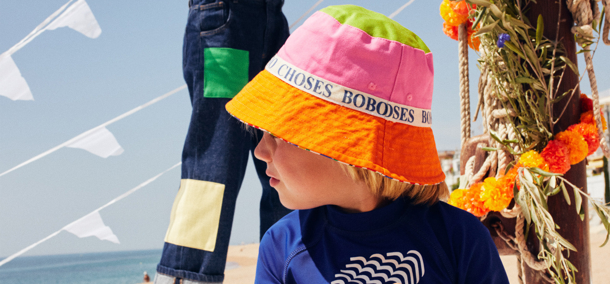 Child wearing bobo choses coloured bucket hat