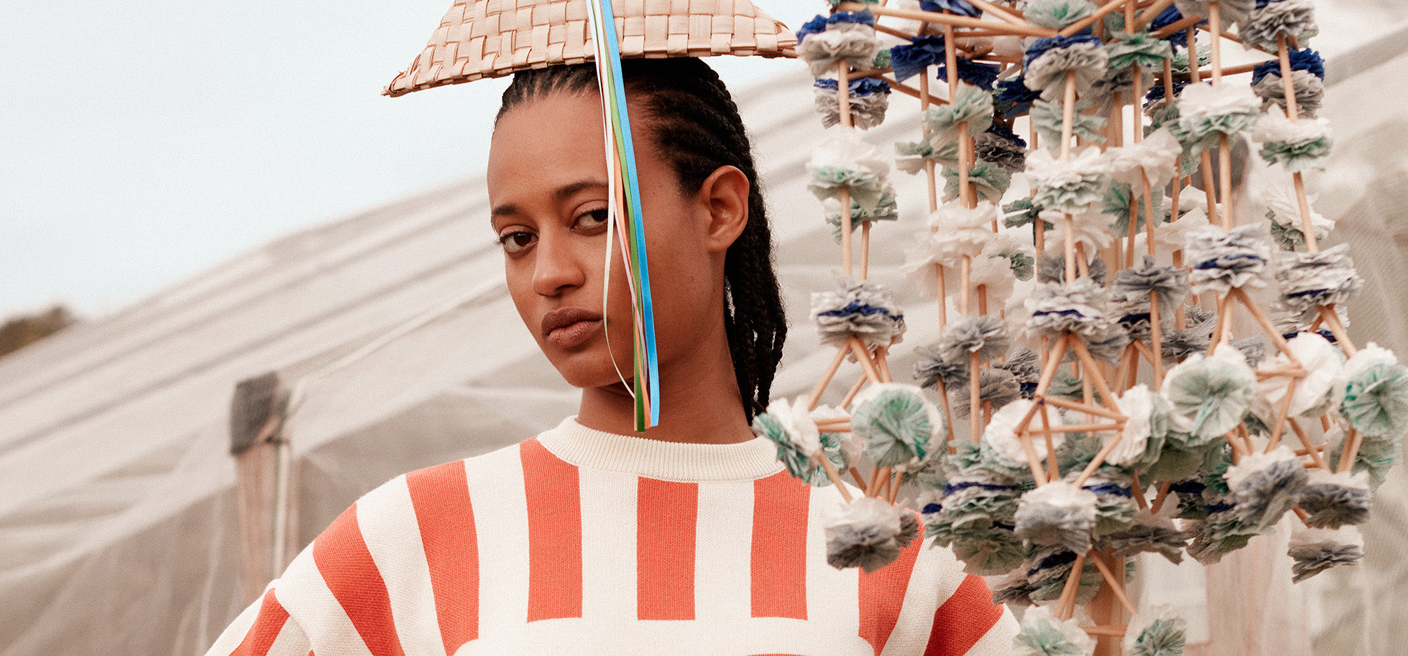 Woman wearing new bobo choses collection featuring a red striped t-shirt