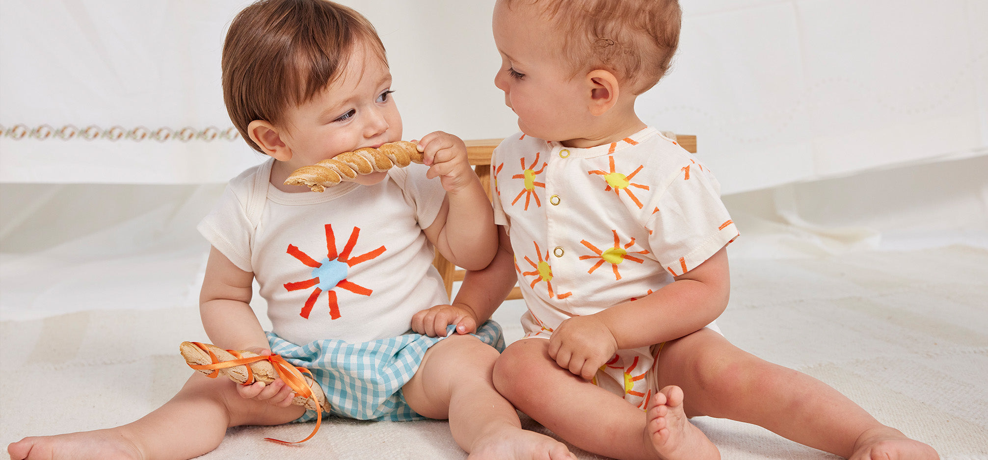Two babies wearing bobo choses spring summer collection