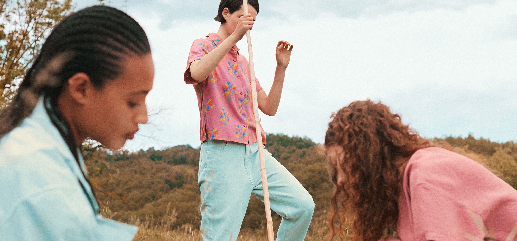 3 Adults in a field wearing bobo choses ss24 collection.