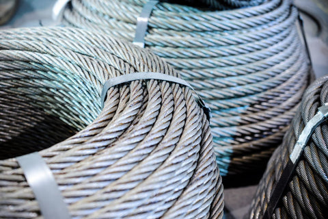 coils of wire rope laying on the cement floor