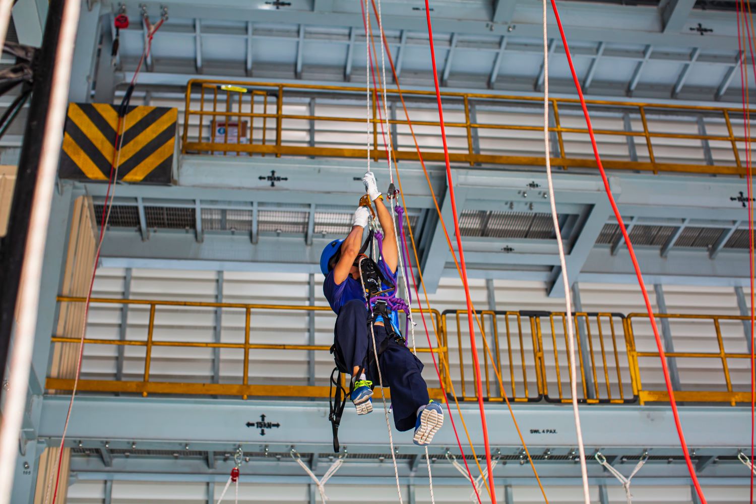 male worker fall rescue plan training with descent equipment