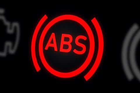 image of abs light on vehicle dashboard