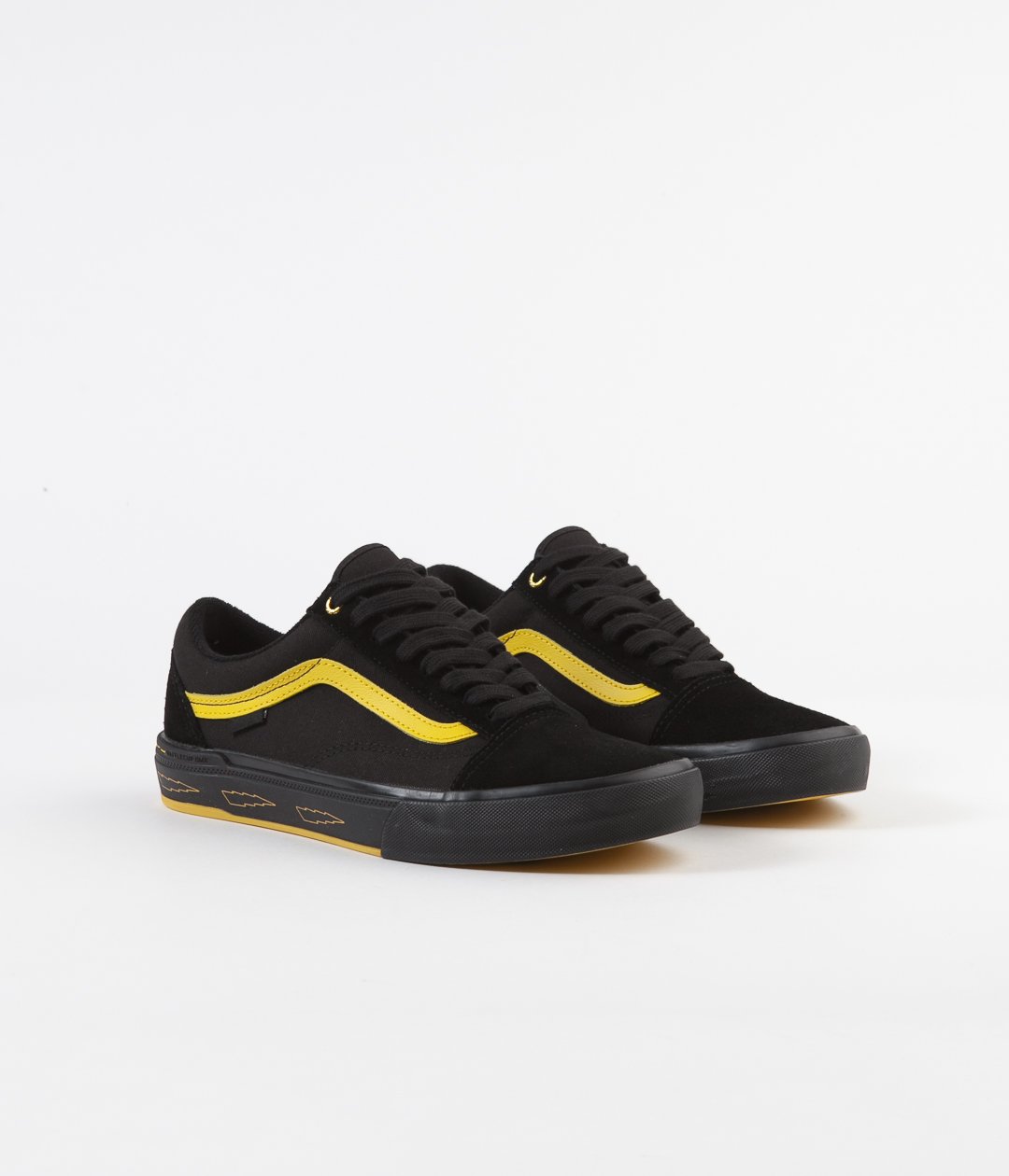 vans black and yellow shoes