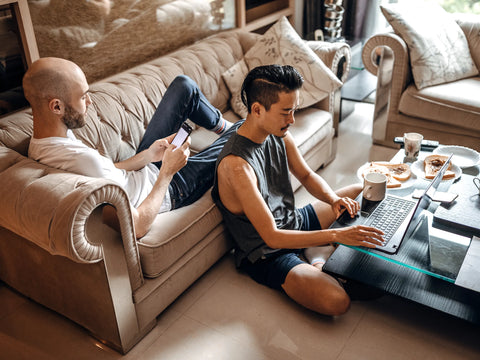 two men lounging at home in comfortable clothing