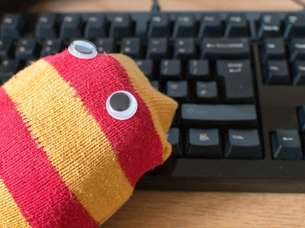 Sock puppet on keyboard