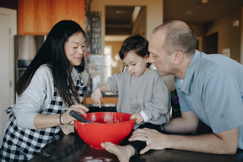 Parents Baking With Child