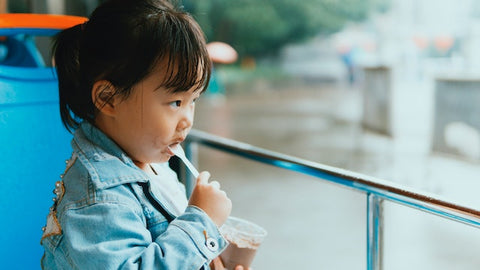 Child using a spoon