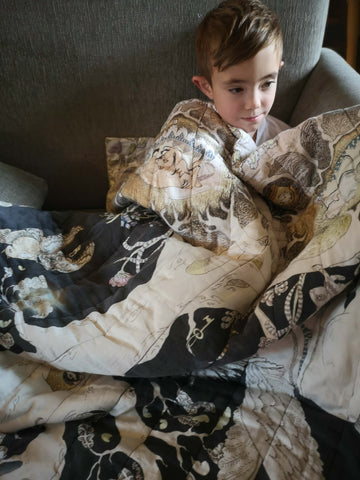 Alfie with his Enchanted Forest Forivor blanket