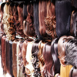 Wigs organized by hangers