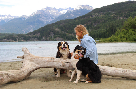 Woman with happy dogs on beach | Whistler Dog Walker