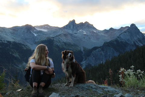 Woman and dog smiling in mountains - Whistler, BC, Canada