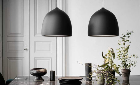 Fritz Hansen Suspense Pendants singular or grouped depending on where you are placing them and their size.