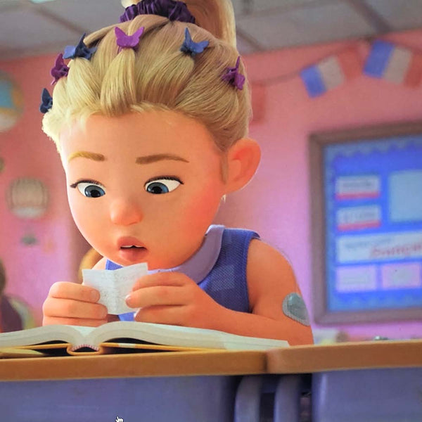 Disney Pixar Turning Red film. Scene with Girl in class reading note.