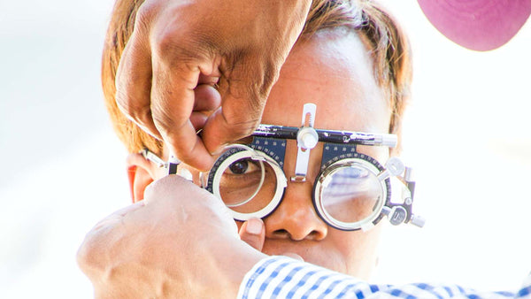 Person having eye examination.