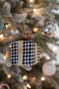 A small plaid gift Christmas tree ornament