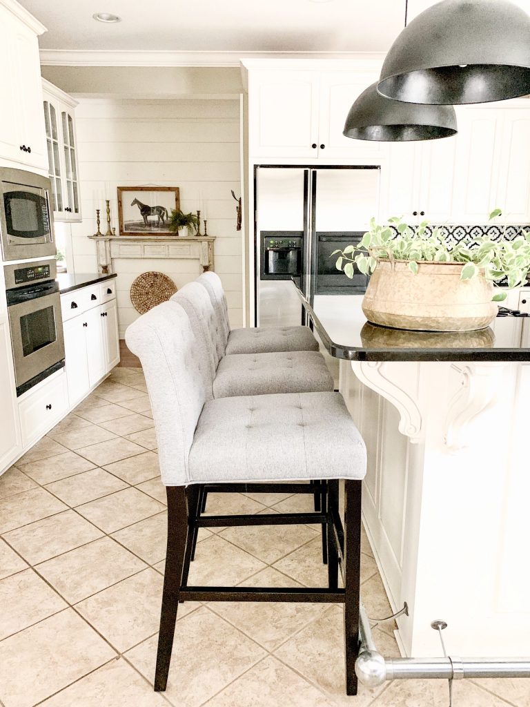 close up of grey bar stools.