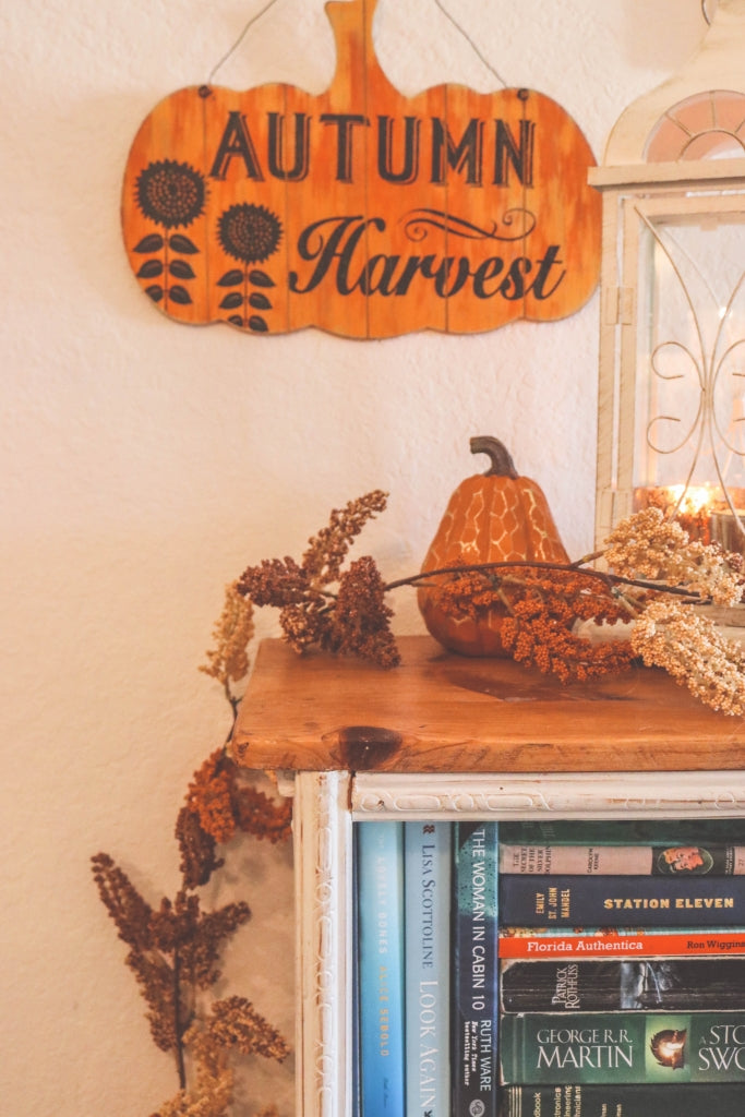 Pumpkins, gourds, squashes and wooden signage