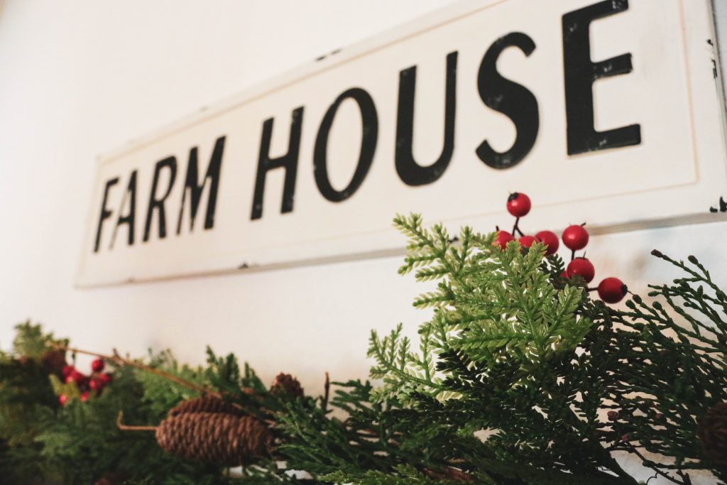 A farm house-themed sign for Christmas décor