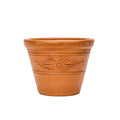 red terracotta pot with design