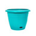Blue plastic planter with bottom watering opening