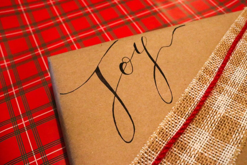 simple wrapping paper with nice lettering via a sharpie