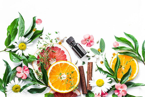 Photo of citrus and natural oil bottle