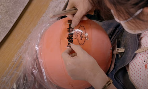 The graphics getting applied to the basketball.