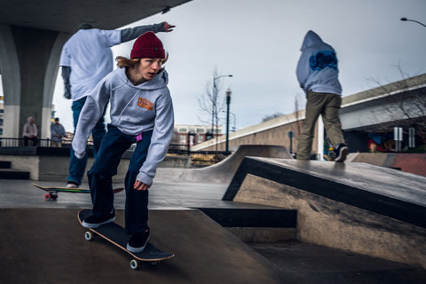 boy with red cap skating