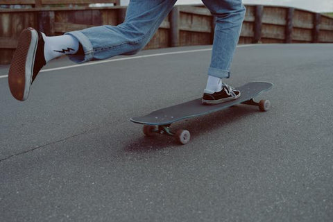 person skating on a road