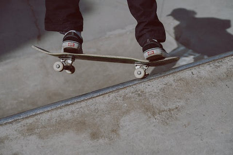 skateboard standing in slop