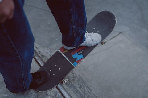 person going down the slop with skateboard