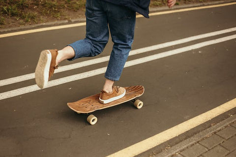 boy skating on road