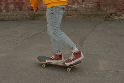 boy with red boots skating