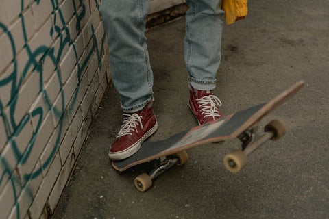 boy skating in a street