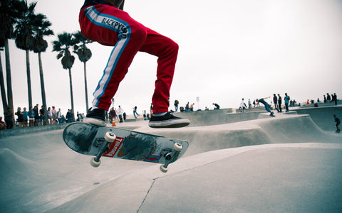 boy skating on road